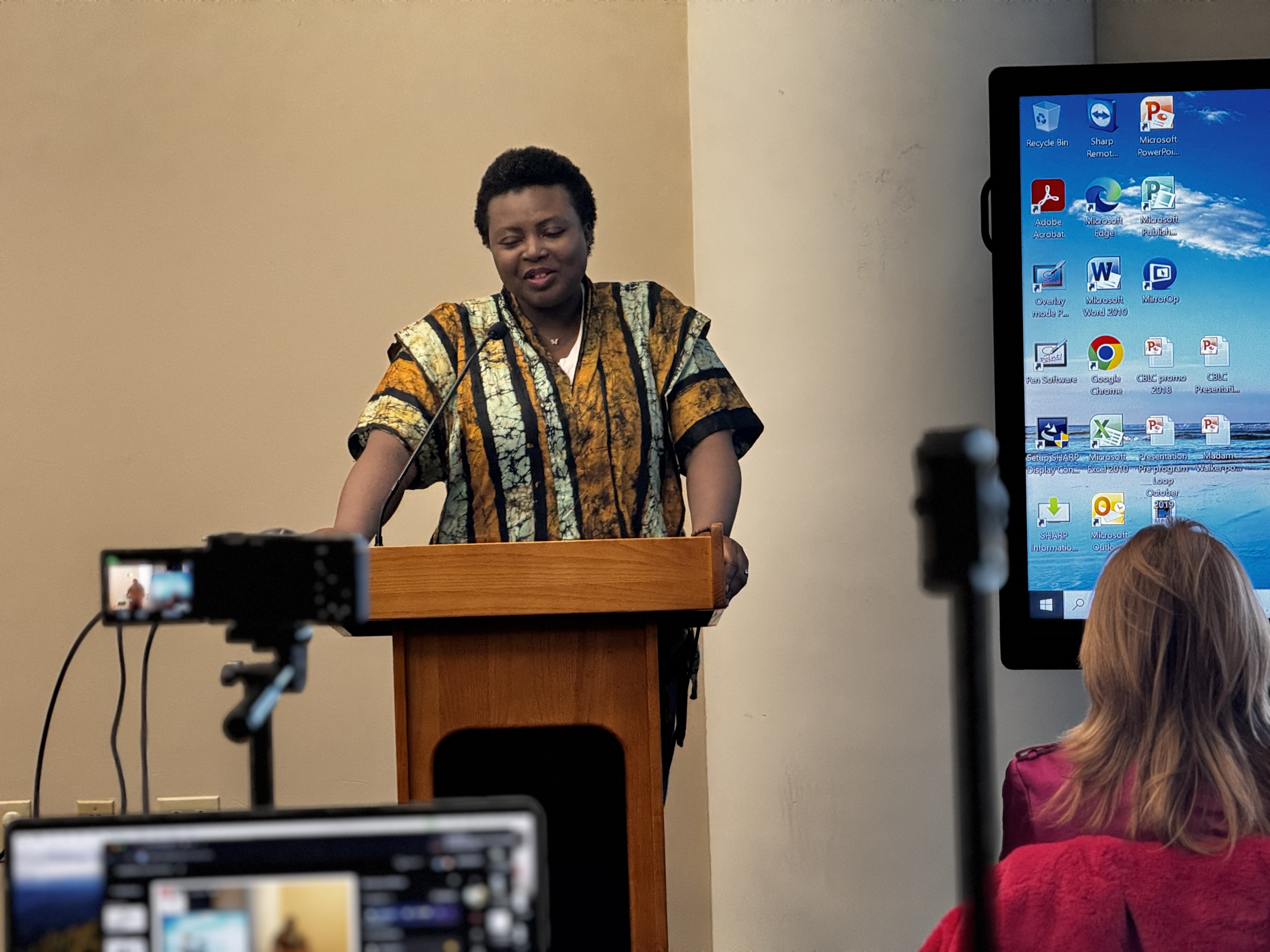 A storyteller takes the stage at Ọgbaniko: Stories from Home